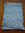 Echarpe rayée turquoise en coton et soie